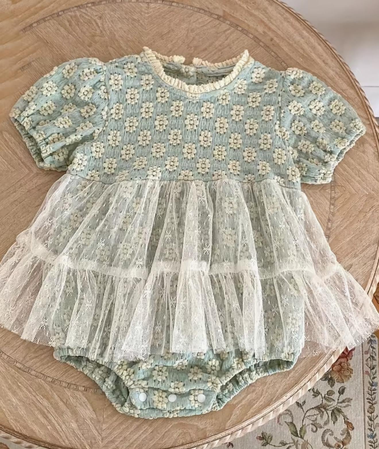 Green Half Sleeved Round Neck Romper with soft net Frills