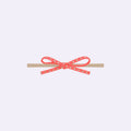 Coral Pink Studded Skinny Bow Baby Headband – Soft Stretchy Nylon Band for Newborns and Toddlers