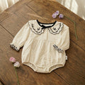 Premium Cream Baby Romper with Embroidered Lace Collar