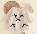 Ivory Long Sleeve Baby Girl Romper with Bow Details