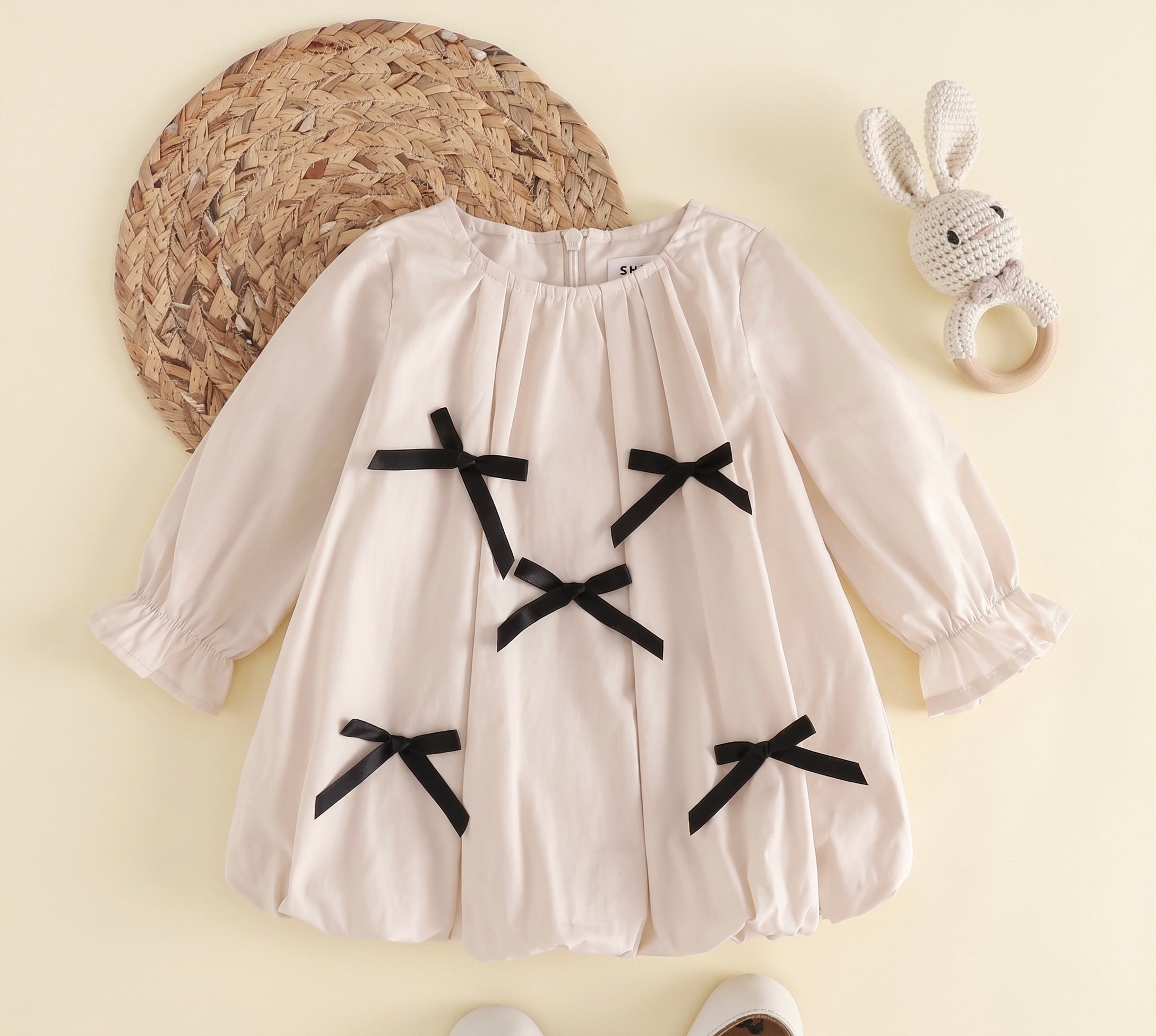 Ivory Long Sleeve Baby Girl Romper with Bow Details