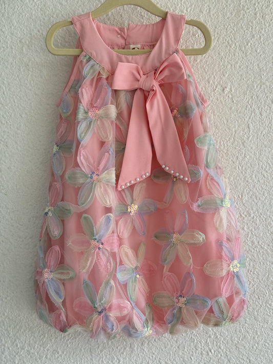 Sleeveless partywear frock with floral works and bow